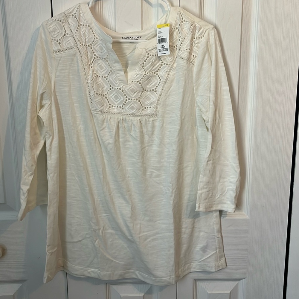 Flowy, three quarter sleeve woman’s top